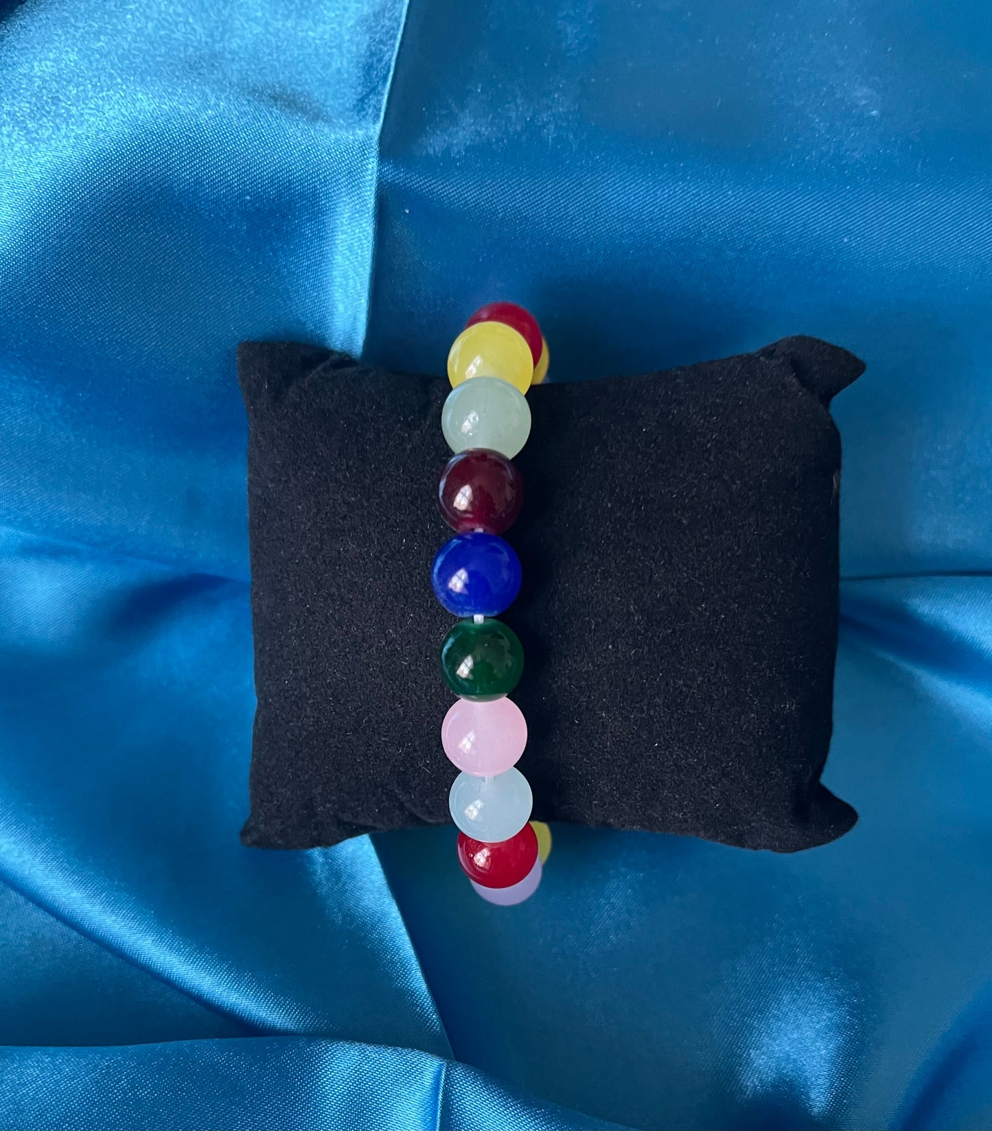 A handmade multicoloured jelly bean bead stretch bracelet