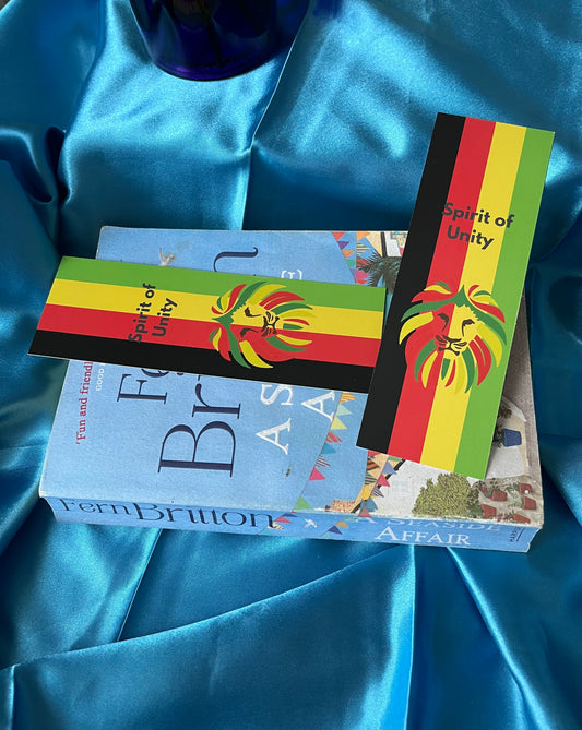 A handmade bookmark in red, gold and green celebrating heritage and unity